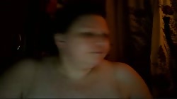 Old Russian BBW lady is posing on the webcam and showing her giant melons